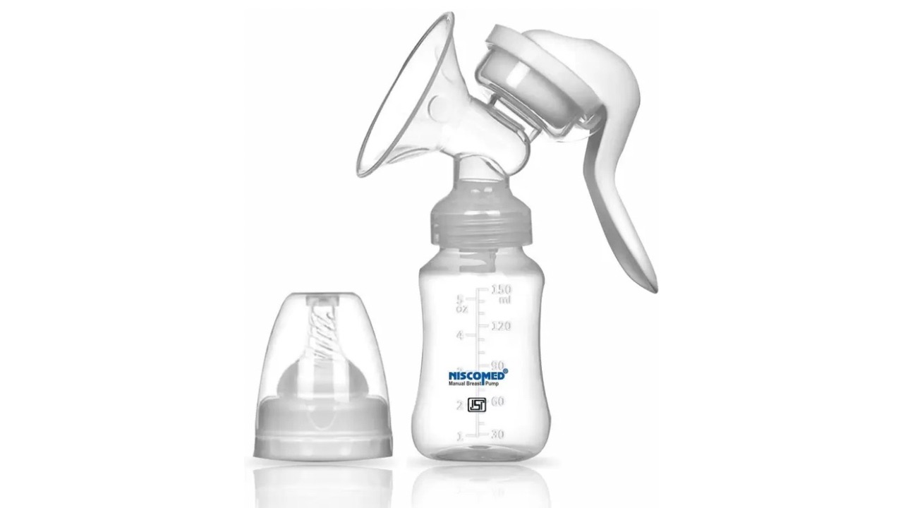 Niscomed First Feed Breast Pump Manual