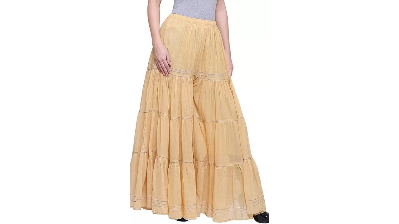 TNQ Flared Women Gold Trousers – A Statement Piece