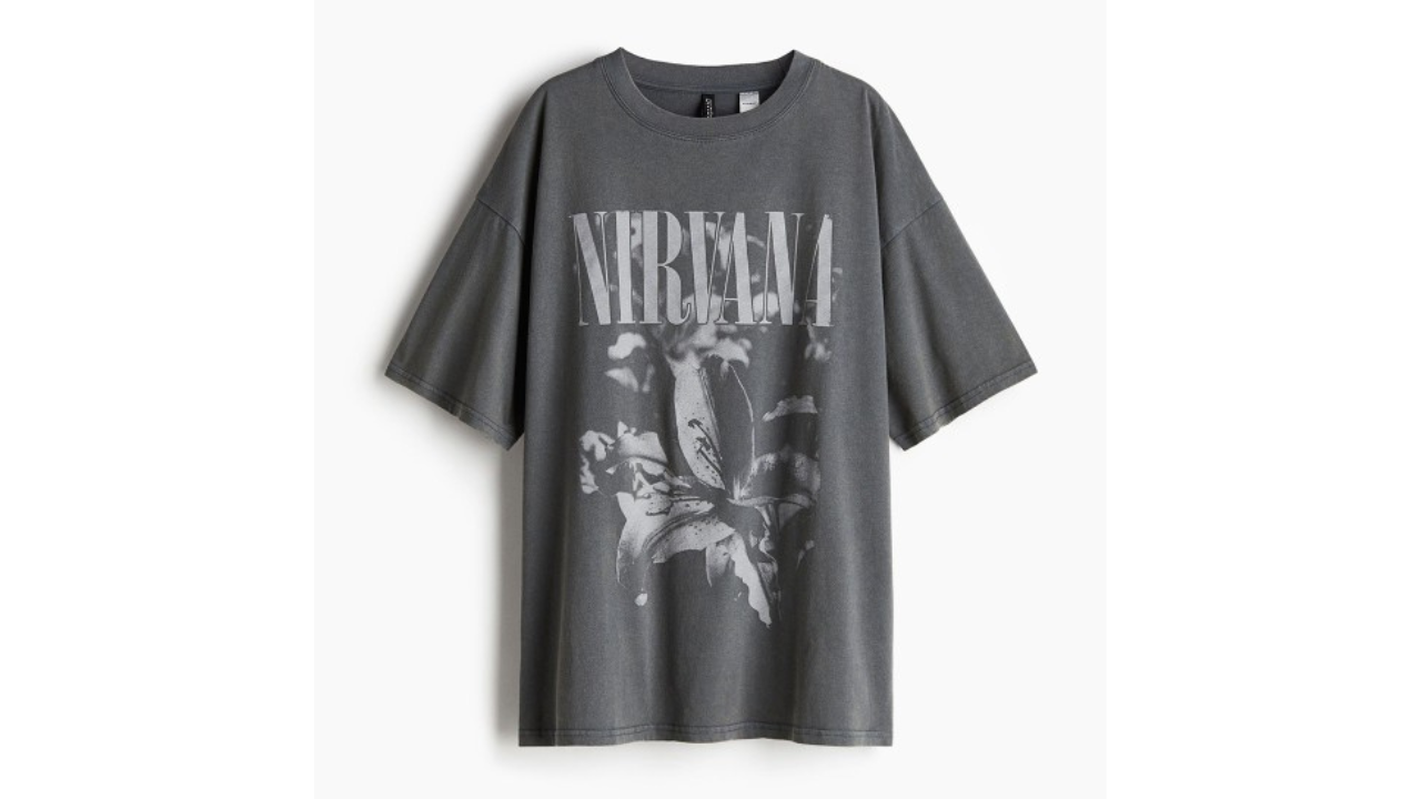 Gunmetal grey oversized Nirvana t-shirt featuring monochrome floral print and vintage wash texture.