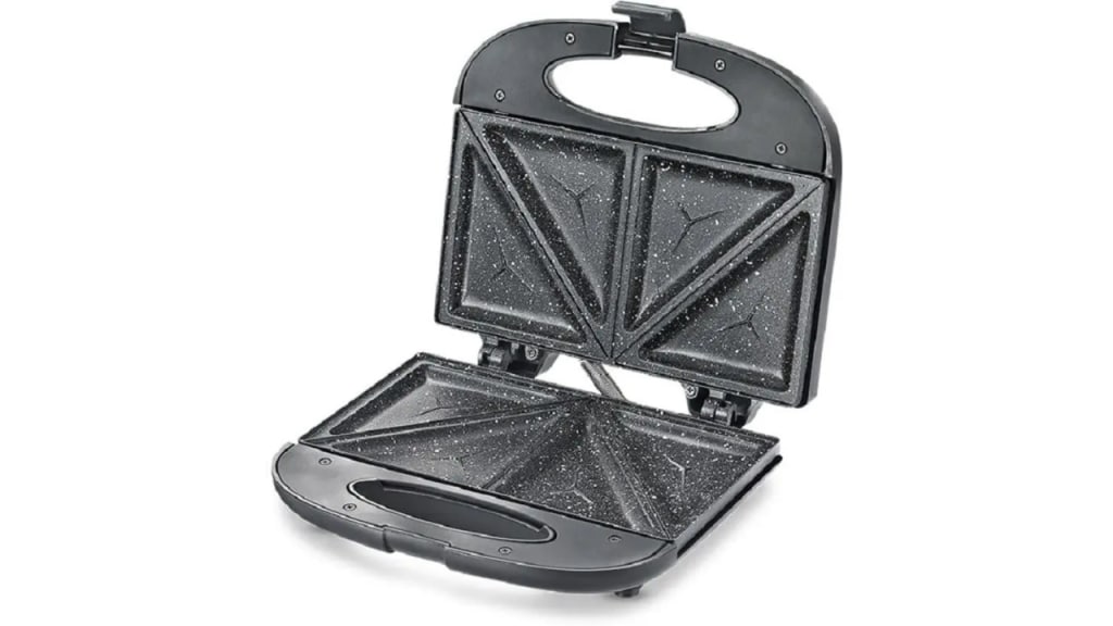 Prestige black sandwich maker with triangle-cut plates and power indicator lights.