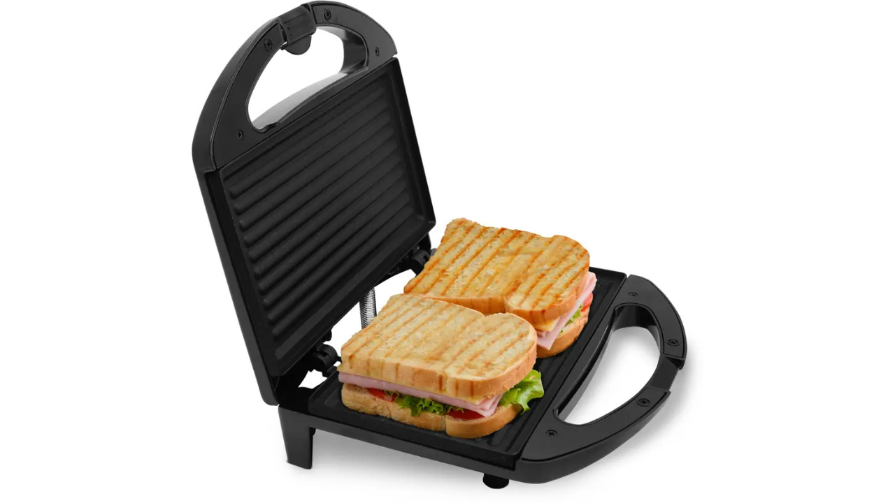V-Guard VSG80 sandwich maker in black with grill plates and heat indicator lights.