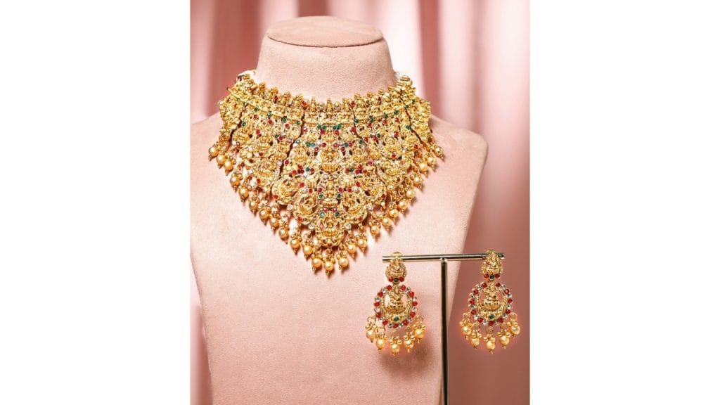 Rubans22K Gold Plated Red, Green & White Stone Studded Lakshmi Motif Temple Jewellery Set