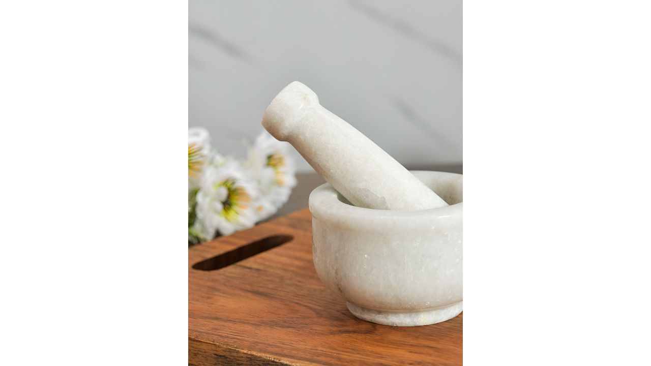 Myntra Elegant Homes White Marble Mortar and Pestle
